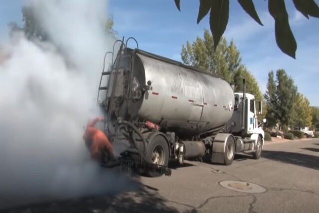 Smoking asphalt paving